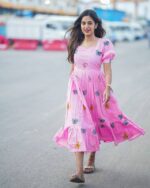 Shop this stunning long pink dress in Parampara cotton with a butterfly design. Perfect summer wear, sizes S-XXL, 46-inch length, and 3.5m flair.