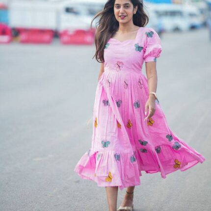 Shop this stunning long pink dress in Parampara cotton with a butterfly design. Perfect summer wear, sizes S-XXL, 46-inch length, and 3.5m flair.